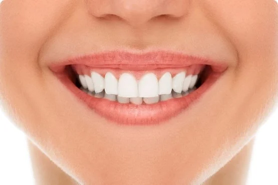 dentist with smile designing ak dental clinic